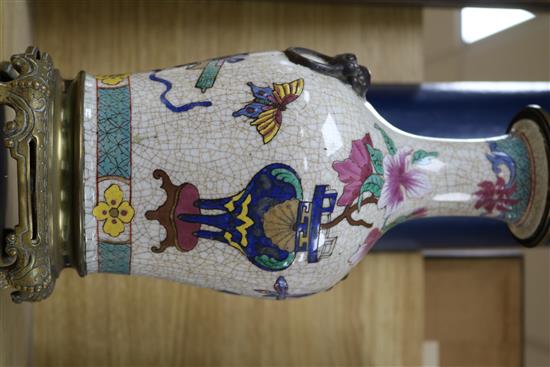 A Chinese famille rose crackle glaze vase, c.1900, mounted as a lamp H.35cm